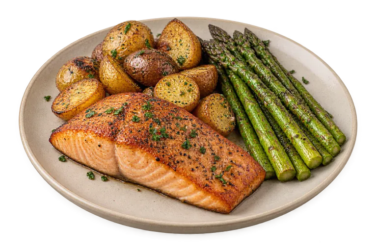 Salmon, potatoes and asparagus on a plate, without a background.